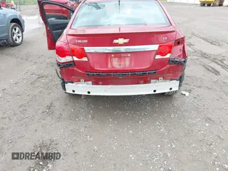 2014 Chevrolet Cruze 1LT z VIN 1G1PC5SB1E7191629, wystawiony jako IAAI lot #42341440 z przebiegiem 109 596 mil mil oraz . Historia ofert i sprzedaży dostępna na DreamBid. Obrazek 6.