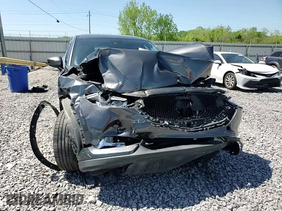 2018 Mazda CX-5 Grand Touring z VIN JM3KFBDM3J0351106, wystawiony jako Copart lot #52553925 z przebiegiem Nie podano mil oraz Szkoda całkowita • Salvage title. Historia ofert i sprzedaży dostępna na DreamBid. Obrazek 11.