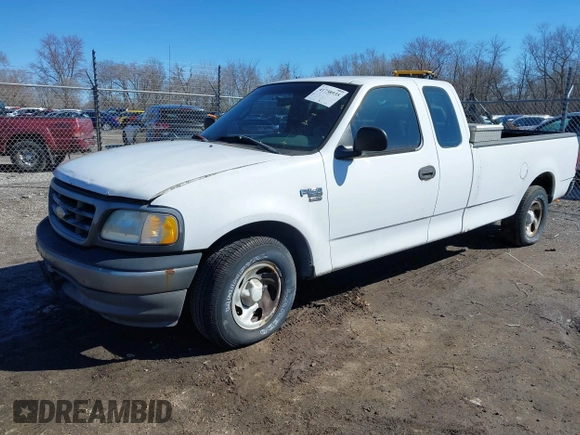 2002 Ford F-150 XL with VIN 1FTRX17L72NA76720, listed as a IAAI auction lot 41738935 with 92,506 mi miles. Bid and sale history available at carsss.com. Image 2.