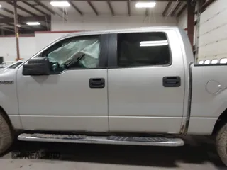 2013 Ford F-150 XL with VIN 1FTFW1EF9DFC77650, listed as a IAAI auction lot 41699427 with 267,769 mi miles. Bid and sale history available at carsss.com. Image 14.