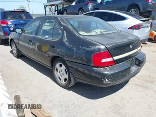 2001 Nissan Altima GXE with VIN 1N4DL01A21C216440, listed as a IAAI auction lot 41999928 with 169,289 mi miles. Bid and sale history available at carsss.com. Image 3.