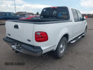 2003 Ford F-150 XLT with VIN 1FTRW07603KC13314, listed as a IAAI auction lot 42684852 with 135,849 mi miles and . Bid and sale history available at DreamBid. Image 4.