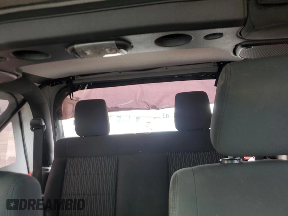 2015 Jeep Wrangler Sport with VIN 1C4AJWAG6FL715453, listed as a Copart auction lot 53686145 with 88,504 mi miles and Salvage Title. Bid and sale history available at DreamBid. Image 10.