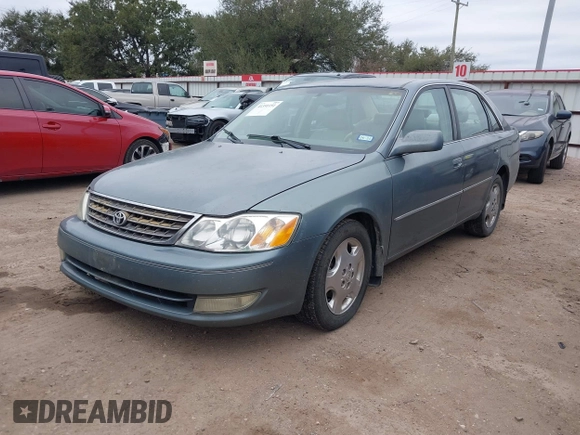 2004 Toyota Avalon XL with VIN 4T1BF28B84U370390, listed as a IAAI auction lot 41351151 with 242,910 mi miles and . Bid and sale history available at DreamBid. Image 2.