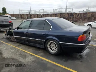 1998 BMW 7 Series 740il with VIN WBAGJ8321WDM23045, listed as a Copart auction lot 87018324 with 43,906 mi miles and Salvage Title. Bid and sale history available at carsss.com. Image 2.