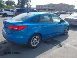 2017 Ford Focus SE with VIN 1FADP3F21HL213563, listed as a IAAI auction lot 42175326 with 101,767 mi miles and . Bid and sale history available at DreamBid. Image 4.