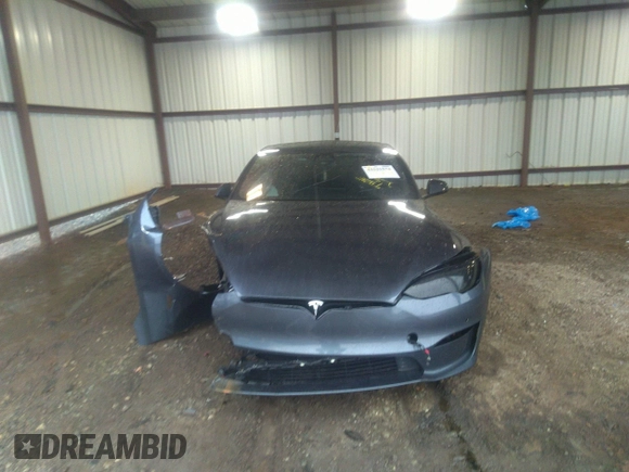2022 Tesla Model S with VIN 5YJSA1E57NF484158, listed as a IAAI auction lot 41531574 with 16,079 mi miles and . Bid and sale history available at DreamBid. Image 12.