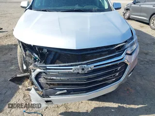 2020 Chevrolet Traverse LT Cloth z VIN 1GNERGKW3LJ319386, wystawiony jako IAAI lot #42308032 z przebiegiem 77 108 mil mil oraz . Historia ofert i sprzedaży dostępna na DreamBid. Obrazek 6.