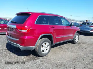 2012 Jeep Grand Cherokee Laredo with VIN 1C4RJFAG7CC297757, listed as a IAAI auction lot 41901645 with 270,731 mi miles. Bid and sale history available at carsss.com. Image 4.