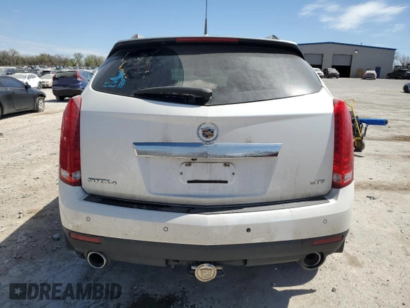 2012 Cadillac SRX Performance Collection with VIN 3GYFNEE30CS548647, listed as a Copart auction lot 49728435 with 70,460 mi miles and Salvage Title. Bid and sale history available at carsss.com. Image 6.