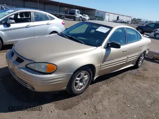 2001 Pontiac Grand Am SE1 with VIN 1G2NF52T01C232451, listed as a IAAI auction lot 41629388 with 152,299 mi miles. Bid and sale history available at carsss.com. Image 2.