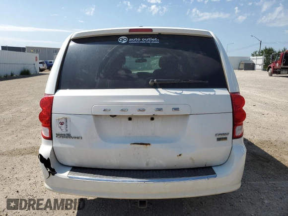 2017 Dodge Grand Caravan Crew Plus with VIN 2C4RDGDG6HR765484, listed as a Copart auction lot 63389874 with 169,529 mi miles and Salvage Title. Bid and sale history available at DreamBid. Image 6.