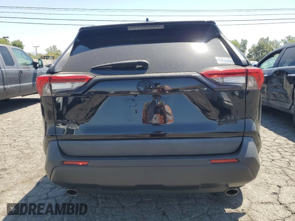 2021 Toyota RAV4 XLE with VIN 2T3P1RFV8MC167485, listed as a Copart auction lot 57814355 with 73,188 mi miles and Salvage title. Bid and sale history available at DreamBid. Image 6.