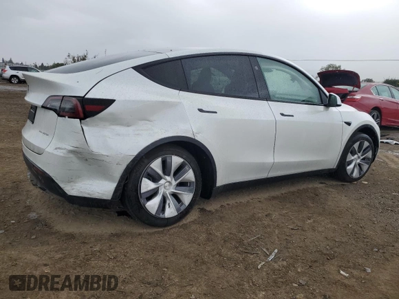 2024 Tesla Model Y Long Range z VIN 7SAYGDEE5RF075756, wystawiony jako Copart lot #48819465 z przebiegiem 10 457 mil mil oraz Szkoda całkowita • Salvage title. Historia ofert i sprzedaży dostępna na DreamBid. Obrazek 3.