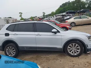 2018 Volkswagen Tiguan S with VIN 3VV1B7AX0JM041120, listed as a IAAI auction lot 42219662 with 160,852 mi miles and . Bid and sale history available at DreamBid. Image 13.