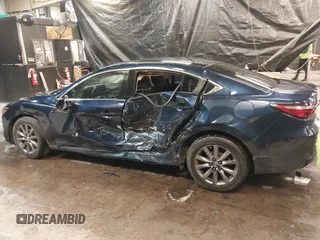 2018 Mazda Mazda6 Sport with VIN JM1GL1UMXJ1330989, listed as a IAAI auction lot 41355353 with 52,869 mi miles. Bid and sale history available at carsss.com. Image 14.