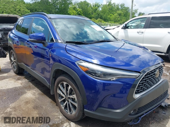 2023 Toyota Corolla Cross XLE with VIN 7MUEAAAG7PV065106, listed as a IAAI auction lot 42168195 with 6,519 mi miles and . Bid and sale history available at DreamBid. Image 12.