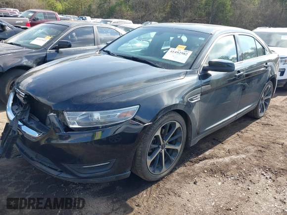 2014 Ford Taurus SEL with VIN 1FAHP2E81EG122928, listed as a IAAI auction lot 41492582 with 200,411 mi miles. Bid and sale history available at carsss.com. Image 2.