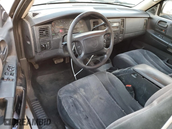 2001 Dodge Dakota z VIN 1B7GL22X51S315149, wystawiony jako Copart lot #41628735 z przebiegiem 295 276 mil mil oraz Czysty tytuł • Clean title. Historia ofert i sprzedaży dostępna na DreamBid. Obrazek 8.