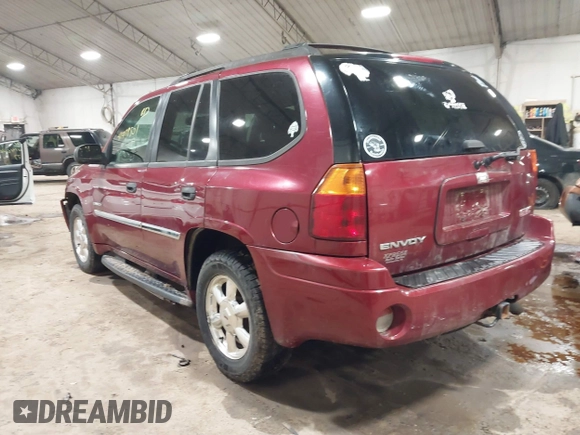 2006 GMC Envoy SLT with VIN 1GKDS13S362135683, listed as a IAAI auction lot 41477501 with 214,760 mi miles. Bid and sale history available at carsss.com. Image 3.