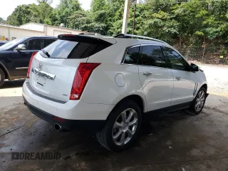 2013 Cadillac SRX Premium Collection with VIN 3GYFNEE30DS529808, listed as a Copart auction lot 61931185 with 131,245 mi miles and Salvage title. Bid and sale history available at DreamBid. Image 3.