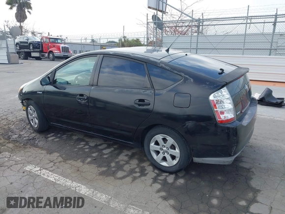 2007 Toyota Prius with VIN JTDKB20U977660315, listed as a IAAI auction lot 42097560 with 158,187 mi miles. Bid and sale history available at carsss.com. Image 3.