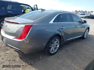 2019 Cadillac XTS Luxury with VIN 2G61M5S35K9125097, listed as a IAAI auction lot 41749076 with 102,585 mi miles. Bid and sale history available at carsss.com. Image 6.