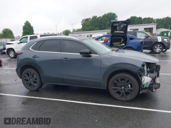 2023 Mazda CX-30 S Carbon Edition with VIN 3MVDMBCM9PM574358, listed as a IAAI auction lot 42105931 with 55,975 mi miles and . Bid and sale history available at DreamBid. Image 14.