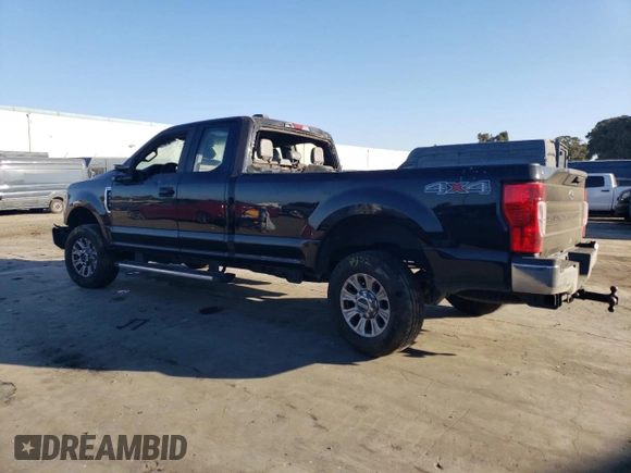 2021 Ford Super Duty F-250 SRW XL with VIN 1FT7X2BN0MEC62141, listed as a Copart auction lot 77142804 with 59,933 mi miles and Salvage Title. Bid and sale history available at carsss.com. Image 2.
