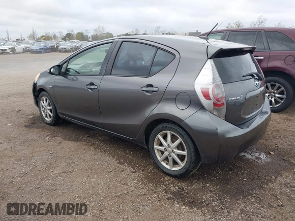 2012 Toyota Prius One z VIN JTDKDTB35C1015243, wystawiony jako IAAI lot #41692077 z przebiegiem 304 394 mil mil oraz . Historia ofert i sprzedaży dostępna na DreamBid. Obrazek 3.