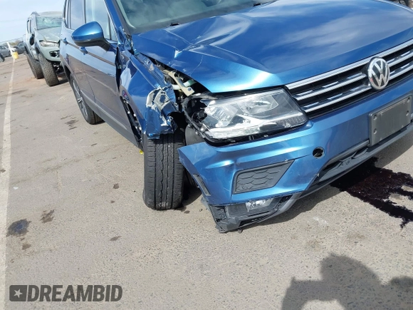 2019 Volkswagen Tiguan SE with VIN 3VV3B7AX2KM064568, listed as a IAAI auction lot 42008754 with 53,132 mi miles and . Bid and sale history available at DreamBid. Image 6.