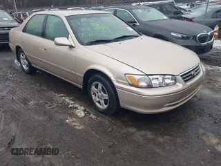 2001 Toyota Camry CE z VIN JT2BG22KX10557930, wystawiony jako IAAI lot #41528362 z przebiegiem Nie podano mil oraz . Historia ofert i sprzedaży dostępna na DreamBid. Obrazek 1.