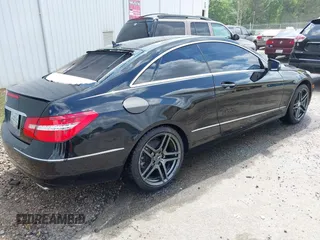 2011 Mercedes-Benz E 350 with VIN WDDKJ5GB8BF105563, listed as a IAAI auction lot 42137915 with 169,319 mi miles and . Bid and sale history available at DreamBid. Image 4.