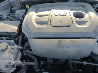 2018 Dodge Durango GT z VIN 1C4RDJDG9JC184153, wystawiony jako Copart lot #70046245 z przebiegiem 55 781 mil mil oraz Szkoda całkowita • Salvage title. Historia ofert i sprzedaży dostępna na DreamBid. Obrazek 14.