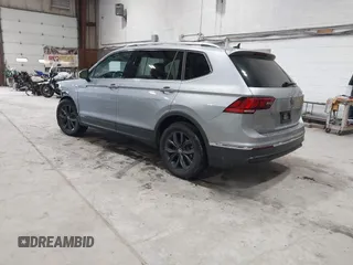 2024 Volkswagen Tiguan SE with VIN 3VVMB7AX8RM084483, listed as a IAAI auction lot 42452619 with 14,618 mi miles and . Bid and sale history available at DreamBid. Image 3.