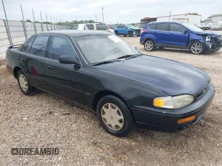 1996 Toyota Camry DX with VIN 4T1BG12K6TU754392, listed as a IAAI auction lot 42013697 with 172,410 mi miles. Bid and sale history available at carsss.com. Image 1.