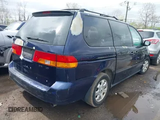 2004 Honda Odyssey EX-L with VIN 5FNRL189X4B045588, listed as a IAAI auction lot 41928397 with 218,182 mi miles and . Bid and sale history available at DreamBid. Image 4.