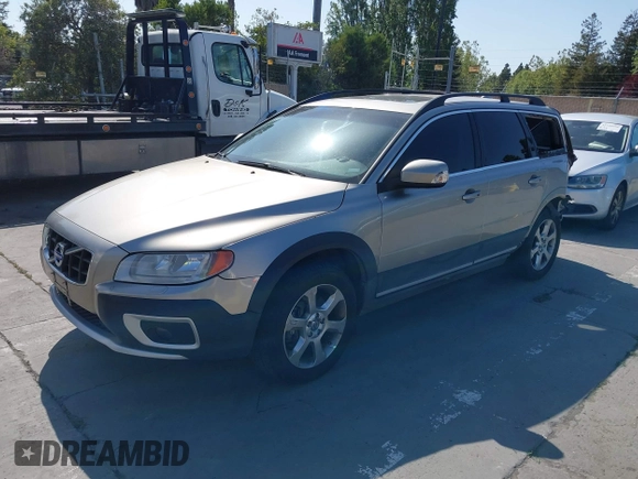 2011 Volvo XC70 3.2L with VIN YV4940BZ0B1095869, listed as a IAAI auction lot 42152626 with 133,696 mi miles and . Bid and sale history available at DreamBid. Image 2.