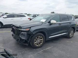 2019 Hyundai Santa Fe SE with VIN 5NMS23AD1KH067456, listed as a IAAI auction lot 41867362 with 105,236 mi miles. Bid and sale history available at carsss.com. Image 18.
