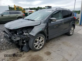 2016 Ford Escape Titanium с VIN 1FMCU9J9XGUC71407, выставлен на аукционе Copart как лот 63694165 с пробегом 121 179 миль миль и Списание • Salvage title. История ставок и продаж доступна на DreamBid. Изображение 1.