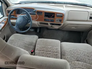 1999 Ford F-250 XL with VIN 1FTNX20S1XEB68189, listed as a Copart auction lot 60920605 with 209,822 mi miles and Salvage title. Bid and sale history available at DreamBid. Image 8.