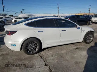 2020 Tesla Model 3 Long Range with VIN 5YJ3E1EB0LF665887, listed as a Copart auction lot 48985245 with 50,309 mi miles and Salvage Title. Bid and sale history available at DreamBid. Image 3.