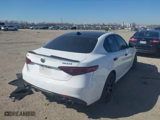 2018 Alfa Romeo Giulia Ti Sport with VIN ZARFAEEN9J7572787, listed as a IAAI auction lot 41646814 with 56,094 mi miles. Bid and sale history available at carsss.com. Image 4.