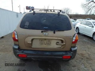 2004 Hyundai Santa Fe GLS with VIN KM8SC13D34U781837, listed as a IAAI auction lot 40452732 with 223,991 mi miles. Bid and sale history available at carsss.com. Image 16.