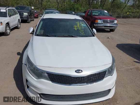 2016 Kia Optima LX Turbo with VIN 5XXGT4L10GG037107, listed as a IAAI auction lot 42071593 with 152,919 mi miles. Bid and sale history available at carsss.com. Image 6.