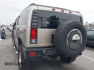 2005 Hummer H2 SUV with VIN 5GRGN23U95H129470, listed as a IAAI auction lot 42046654 with 63,489 mi miles. Bid and sale history available at carsss.com. Image 3.