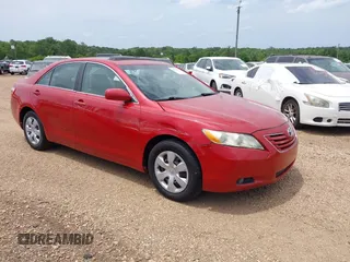 2009 Toyota Camry LE with VIN 4T1BK46K69U088301, listed as a IAAI auction lot 42125792 with 210,184 mi miles. Bid and sale history available at carsss.com. Image 1.