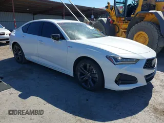 2021 Acura TLX w/A-Spec Package with VIN 19UUB5F51MA006774, listed as a IAAI auction lot 42324304 with 34,745 mi miles and . Bid and sale history available at DreamBid. Image 1.