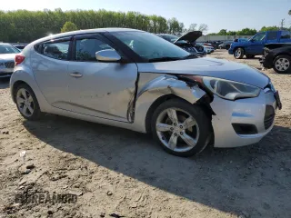 2012 Hyundai Veloster w/Black Int with VIN KMHTC6AD6CU032033, listed as a Copart auction lot 52614775 with 173,476 mi miles and Salvage title. Bid and sale history available at DreamBid. Image 4.