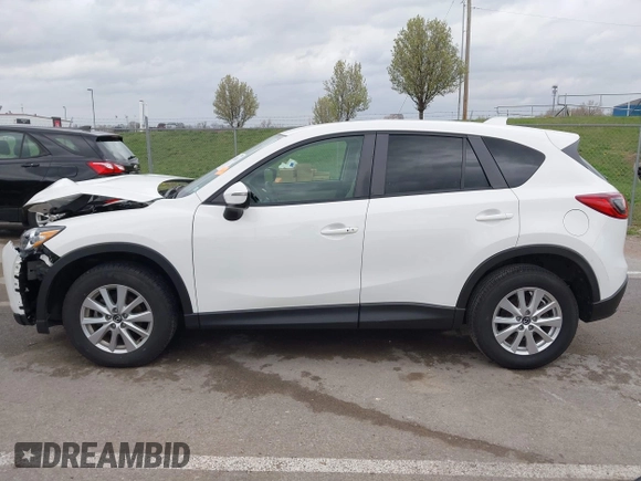 2015 Mazda CX-5 Touring with VIN JM3KE2CY3F0550624, listed as a IAAI auction lot 41931268 with 51,588 mi miles and . Bid and sale history available at carsss.com. Image 14.